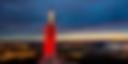 Rødt Ullandhaugtårn foran fargerik horisont